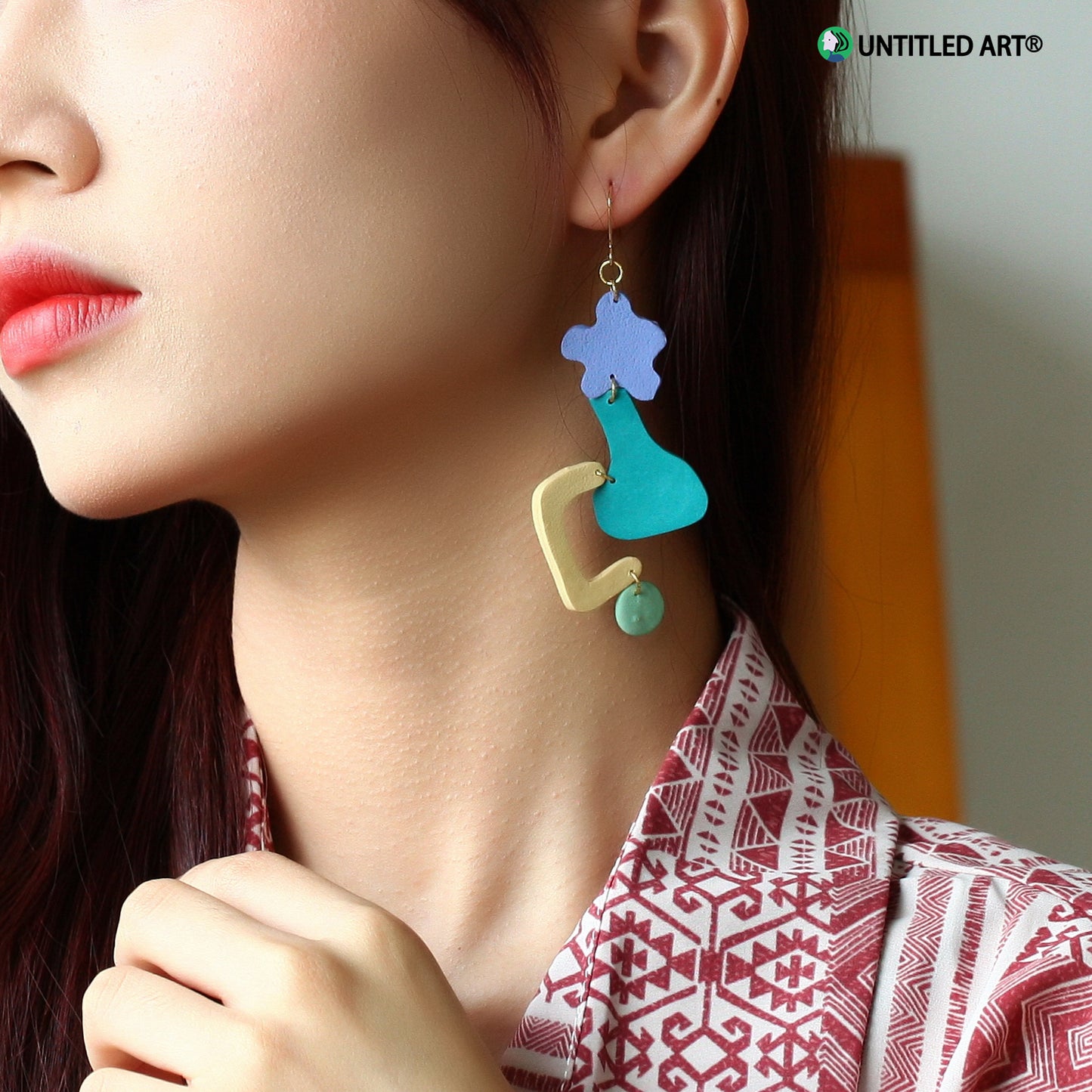 Small pear soup original design handmade abstract art exaggerated earrings ear clips Morandi