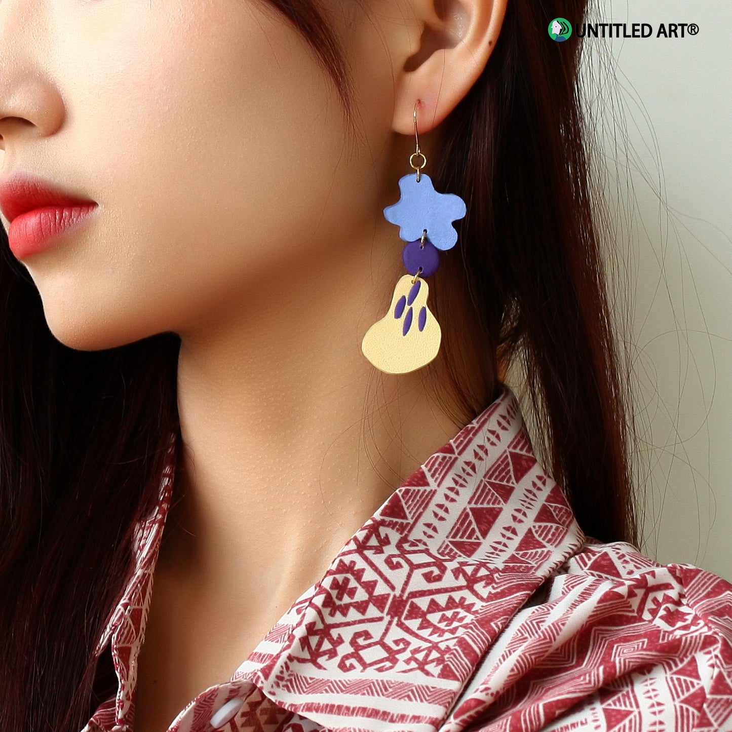 Small pear soup original design handmade abstract art exaggerated earrings ear clips Morandi